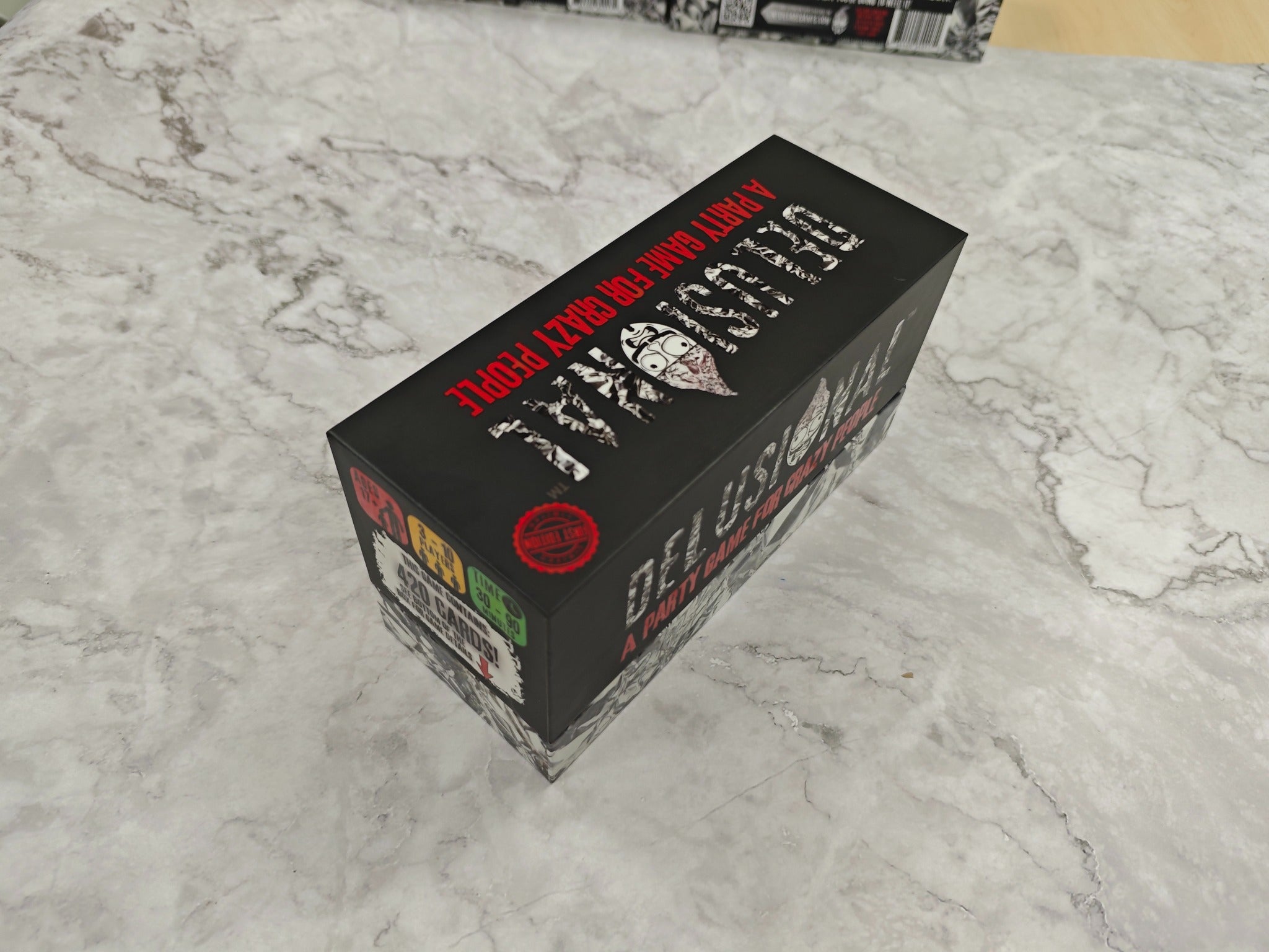 Delusional First Edition game box